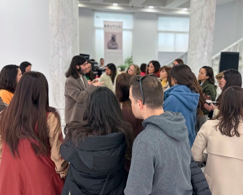 Visitors in conversation during an art encounter